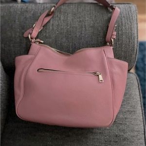 Pink coach purse medium in size.